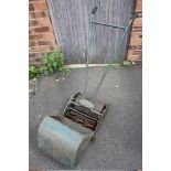 A VINTAGE ZEPHYR GREENS LAWN MOWER