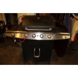 A PHOENIX 4 BURNER GAS BARBECUE