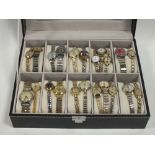 A MODERN WATCH BOX CONTAINING A QUANTITY OF LADIES WRISTWATCHES