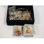 A BOX OF COSTUME JEWELLERY