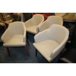 A SET OF FOUR MODERN TUB TYPE UPHOLSTERED CHAIRS