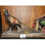 A VINTAGE PHEASANT SHAPED TABLE LIGHTER