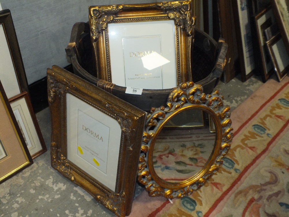 MODERN WICKER WARE BASKET CONTAINING PICTURES FRAMED AND A MIRROR