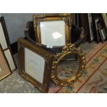 MODERN WICKER WARE BASKET CONTAINING PICTURES FRAMED AND A MIRROR