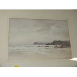 A FRAMED AND GLAZED WATERCOLOUR DEPICTING A BEACH SCENE SIGNED LEONARD CASLEY