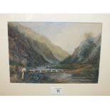 A GILT FRAMED AND GLAZED JOHN THORLEY WATERCOLOUR DEPICTING A MOUNTAINOUS RIVER SCENE WITH FIGURE