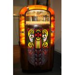 A VINTAGE 1948 ROCK-OLA 1422 JUKEBOX, part of the Rock-Ola "Magic Glow" series, complete with