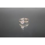 A PLATINUM DIAMOND SOLITAIRE RING, having a brilliant cut diamond of an estimated half a carat,