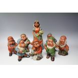 A SET OF EARLY TO MID 20TH CENTURY SNOW WHITE AND THE SEVEN DWARVES TERRACOTTA GARDEN FIGURES /