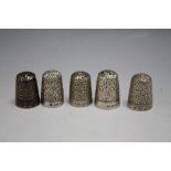 FIVE HALLMARKED SILVER THIMBLES