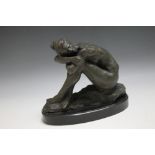 A BRONZED TYPE FIGURE OF A FEMALE NUDE, W 25 cm