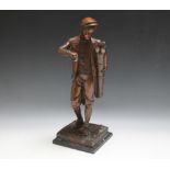 A TALL BRONZE TYPE LAMP IN THE FORM OF A YOUNG GOLFER, H 56 cm