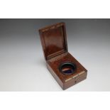 A MAHOGANY POCKET WATCH BOX, D 12.5 cm