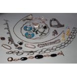 A COLLECTION OF SILVER JEWELLERY ITEMS, comprising five pendants, four pairs of earrings, four