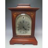 AN EARLY 20TH CENTURY GUSTAV BECKER INLAID MAHOGANY BRACKET CLOCK, the architectural case with