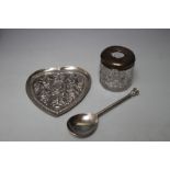 A HALLMARKED SILVER SEAL TOP SPOON - SHEFFIELD 1934, together with a heart shaped Anglo Indian white