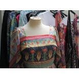 A QUANTITY OF LADIES VINTAGE CLOTHING, various styles and periods, comprising 60s, 70s and 80s