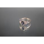 AN 18CT WHITE GOLD SAPPHIRE AND DIAMOND RING, in a rub over setting, approx weight 4.2g, ring size N