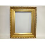 A 19TH CENTURY GOLD FRAME WITH ACANTHUS LEAF DESIGN TO OUTER EDGE, egg and dart design to inner