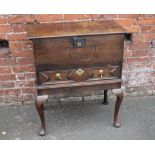 AN ANTIQUE OAK CHEST ON STAND, the hinged lid above a single drawer, bearing date to the front '