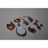 A COLLECTION OF MAINLY 9CT GOLD GEMSET PENDANTS, together with two pairs of matched earrings,