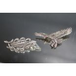 A SILVER AND MARCASITE EAGLE BROOCH TOGETHER WITH A SIMILAR LEAF BROOCH, W 7.5 cm