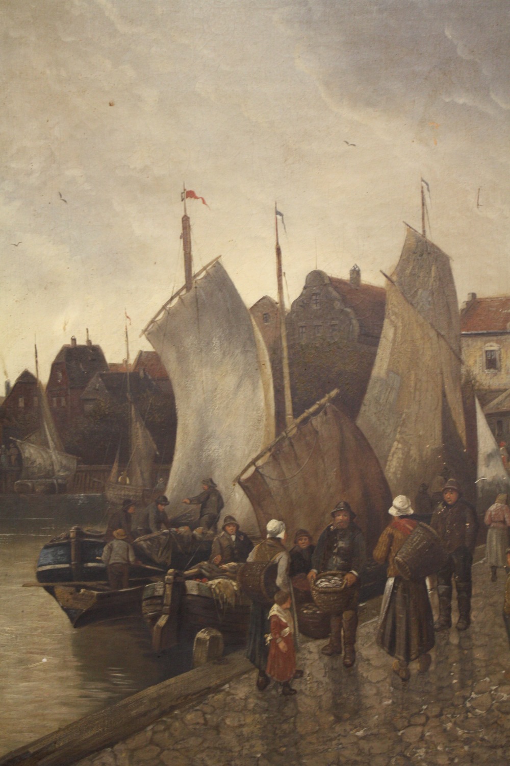 R. MONTI (XIX). Continental school, coastal town scene with moored fishing boat, fishermen and