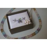 A 14K WHITE GOLD GEMSET BUTTERFLY PENDANT, H 1.3 cm, together with a similar pair of earrings marked