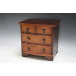 A SATINWOOD CROSSBANDED MINIATURE CHEST OF DRAWS, W 21.75 cm