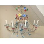 A LARGE TRADITIONAL MURANO GLASS CHANDELIER, eight branch with swirled and coloured leaf drops and