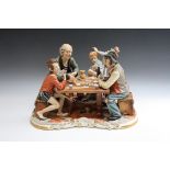 A CAPO DI MONTE FIGURE OF BOYS PLAYING MEN AT CARDS, W 37 cm