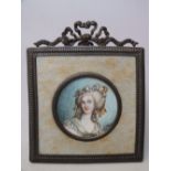 (XX). French school, circular portrait miniature of a lady of fashion, indistinctly signed lower