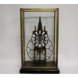 AN EARLY 21ST CENTURY GLASS CASED GREAT WHEEL SKELETON CLOCK, overall case