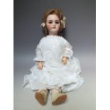 SIMON & HALBIG - A Simon & Halbig doll with bisque head, marked to neck S H 1079 DEP, brown sleeping