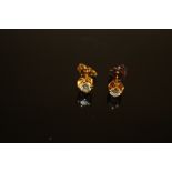 A PAIR OF 18 CARAT GOLD DIAMOND STUDS, the diamonds being an estimated quarter carat each