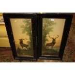 A PAIR OF VINTAGE FRAMED AND GLAZED STAG PRINTS