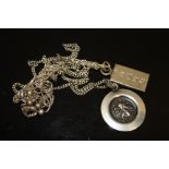 A HALLMARKED SILVER INGOT ON CHAIN TOGETHER WITH A ST CHRISTOPHER PENDANT ETC