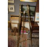 A VINTAGE BRASS EASEL