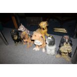 A QUANTITY OF LARGE FIRE SIDE STYLE DOG FIGURES