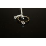 A PLATINUM DIAMOND SOLITAIRE RING, having a brilliant cut diamond of an estimated half a carat,