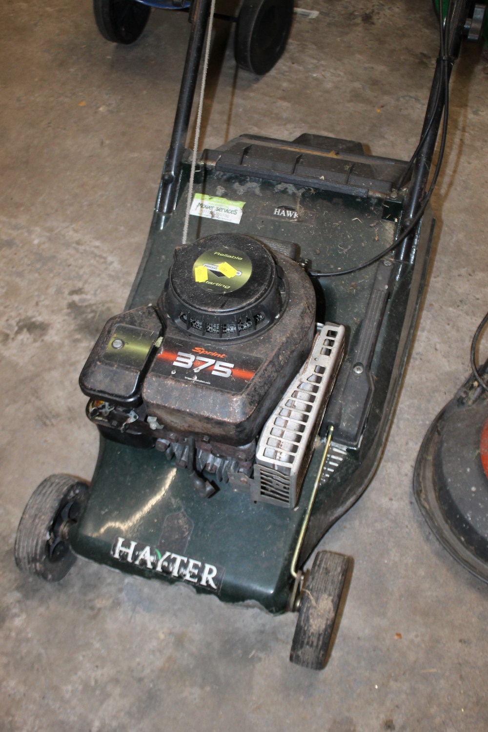 A PETROL HAYTER LAWN MOWER