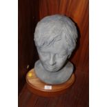 A CERAMIC HEAD BUST