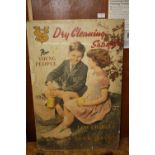 A VINTAGE 'DRY CLEANING SATISFIES' ADVERTISING SIGN