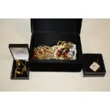 A BOX OF ASSORTED COSTUME JEWELLERY