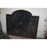 A CAST FIRE BACK WITH ROYAL COAT OF ARMS DETAIL