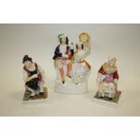 THREE STAFFORDSHIRE TYPE FIGURES TO INCLUDE A COBBLER AND HIS WIFE