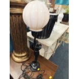 A FIGURATIVE ART DECO STYLE TABLE LAMP WITH SHADE