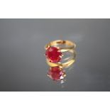 A HALLMARKED 9 CARAT GOLD RUBY SOLITAIRE RING, in high gallery setting, the ruby being an