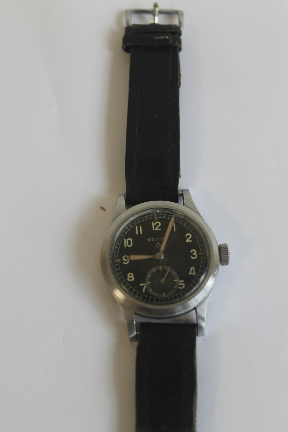 W.W.W. WWII "RECORD" MILITARY WRIST WATCH, with black dial and engraved case markings