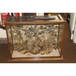 A VICTORIAN TAXIDERMY, A DISPLAY OF HUMMING BIRDS IN A NATURALISTIC SETTING IN A GLAZED CABINET, 103